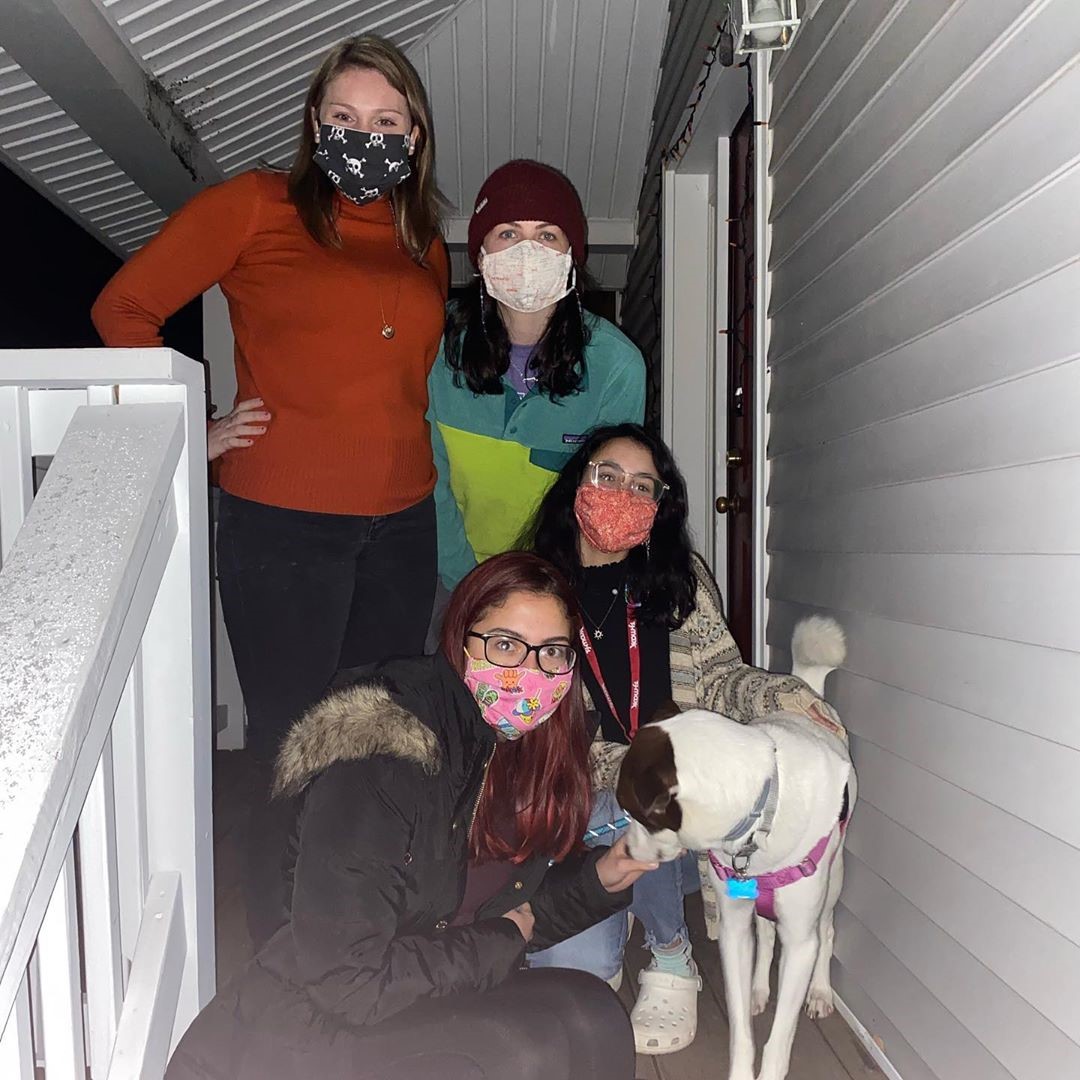 Image of Off-Campus Residents on Porch with Masks