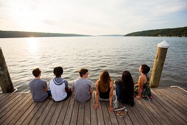 Image of Students Sitting on a Lake
