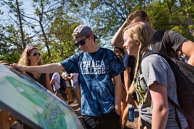 Image of Students Viewing a Map at Ithaca College